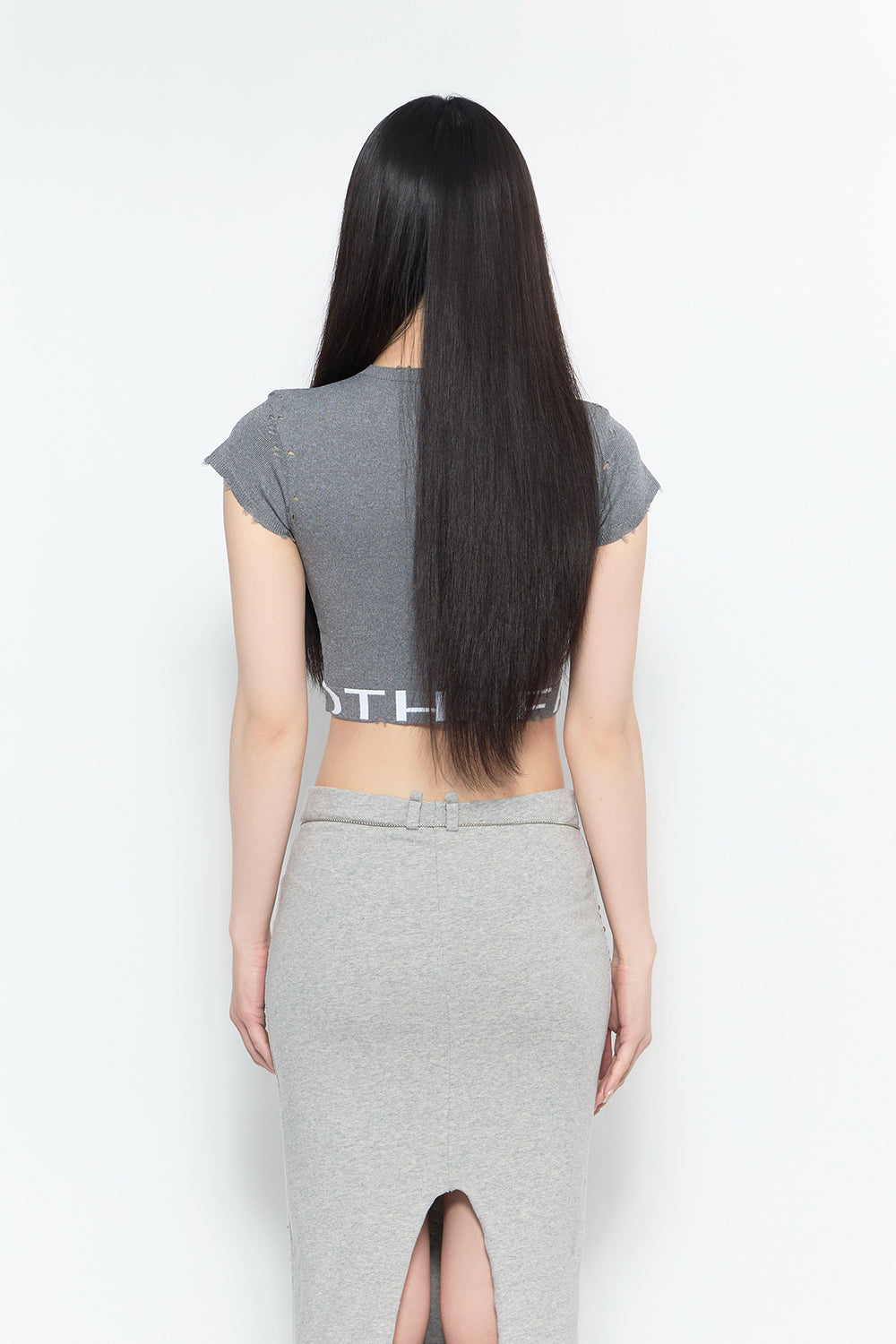 damage tops half logo