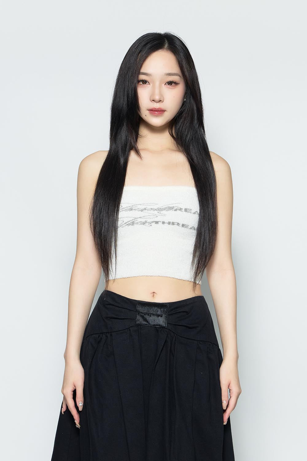 S logo fluffy bare tops