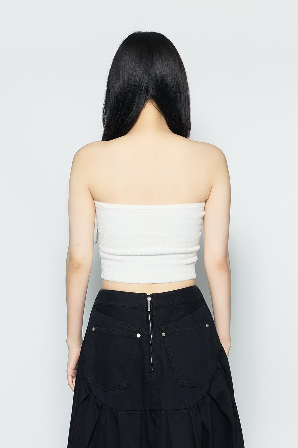 S logo fluffy bare tops