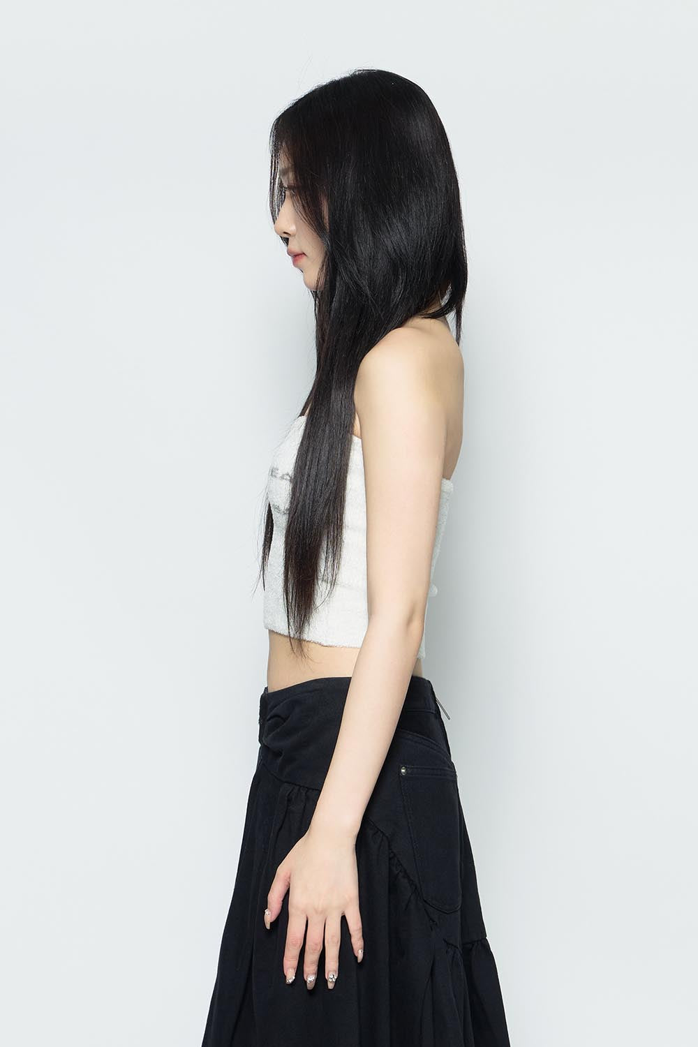S logo fluffy bare tops